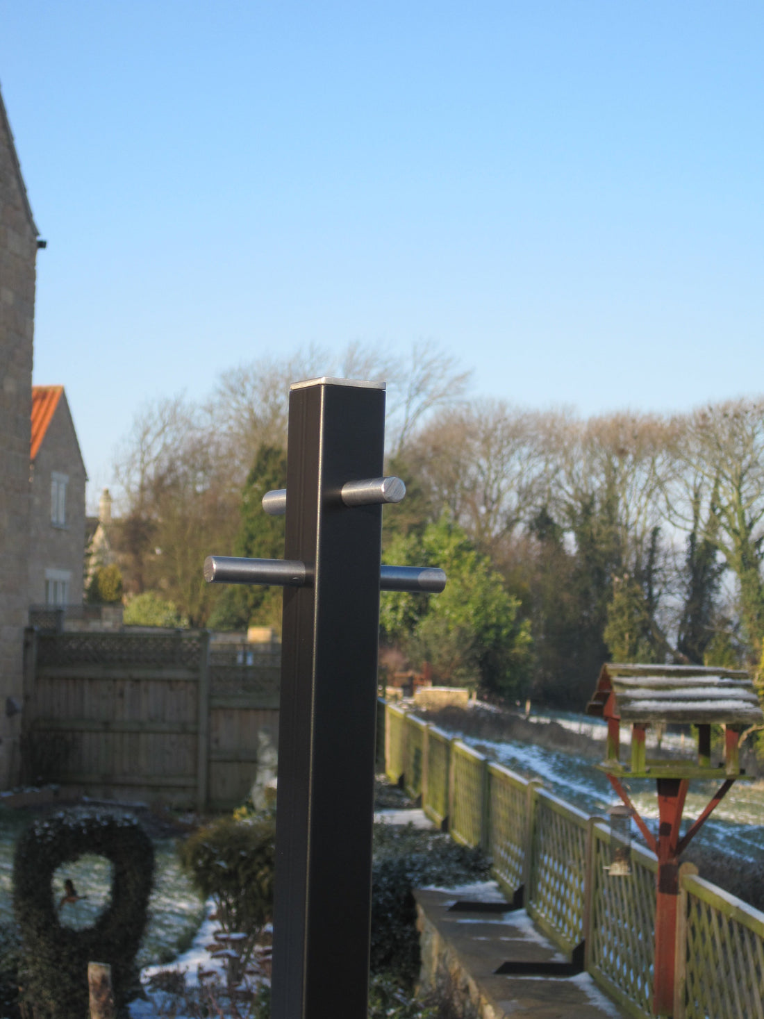 Square black steel washing line post made in Sheffield – Celebrating Helga Stentzel's Clothesline Creatures