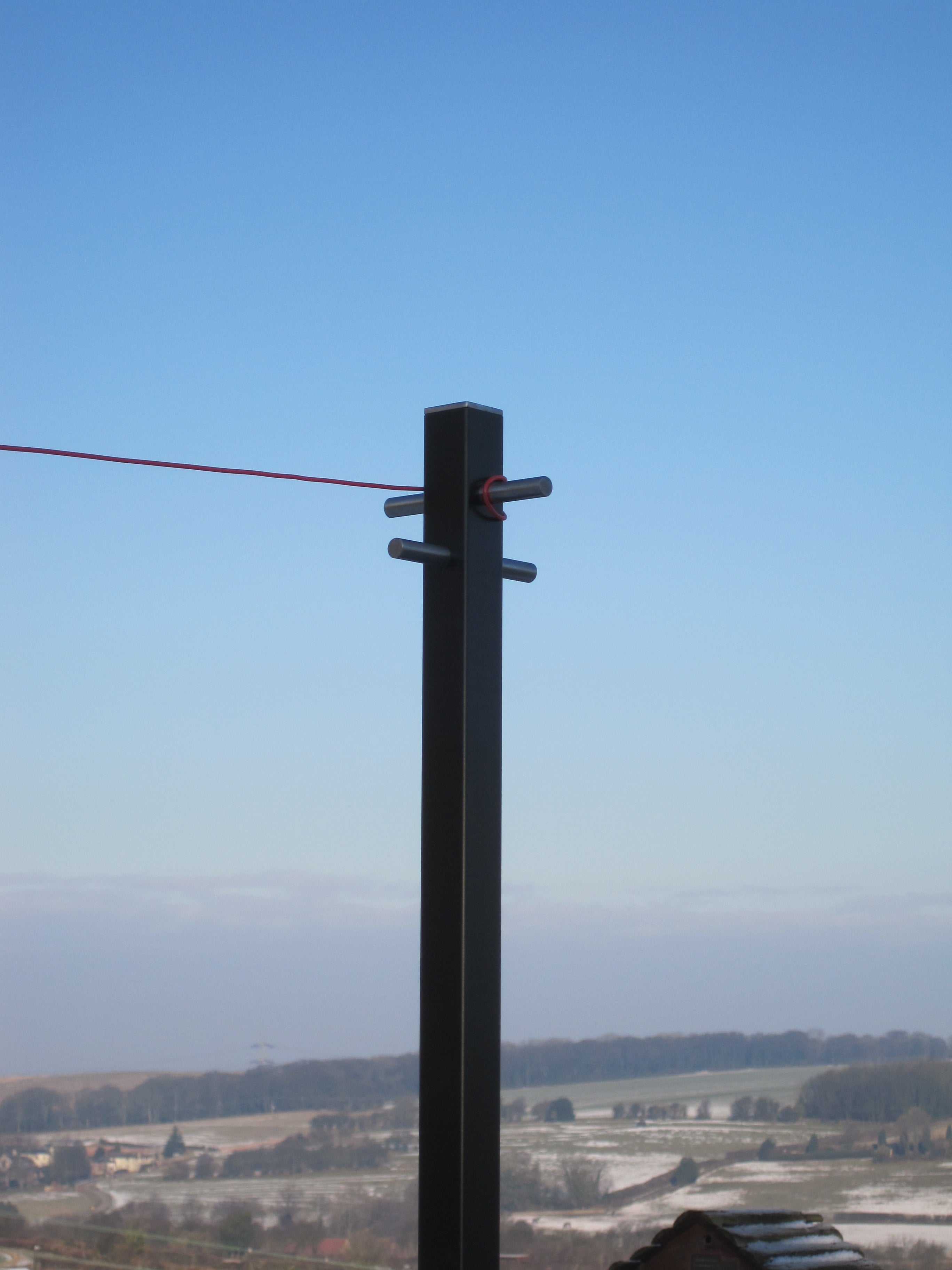 The Modern One washing line pole, 40mm square section in a black powder-coated finish