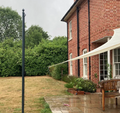 Galvanised steel shade sail pole with a fixing eye for anchoring a garden shade sail